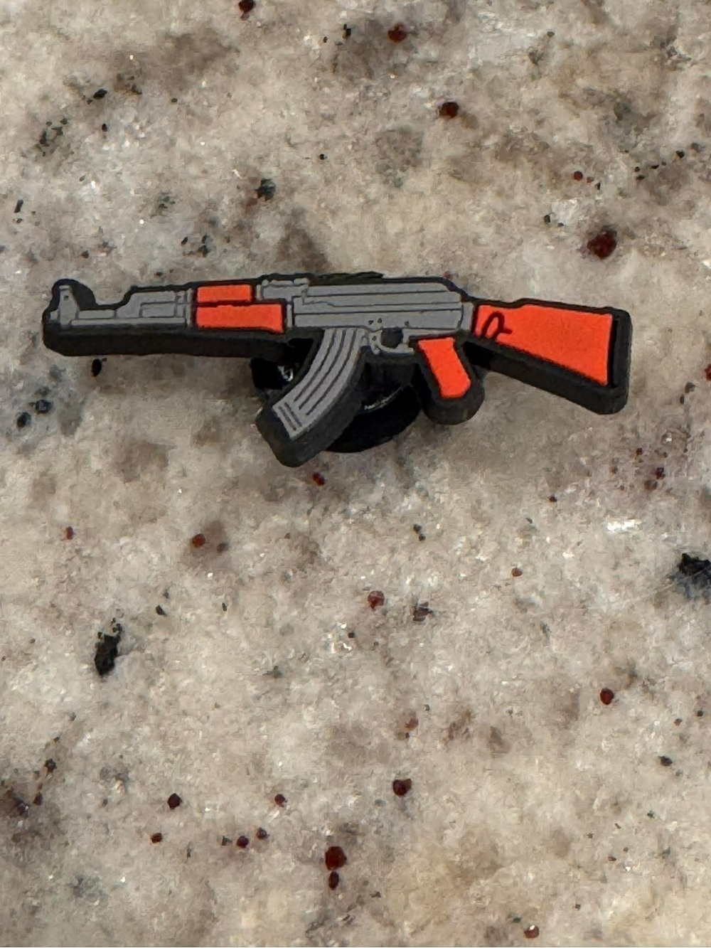 CROCS Rifle Jibbitz Charm in Orange and Gray